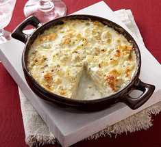 Картофель, запечённый в соусе из сыра: нежный и простой в исполнении