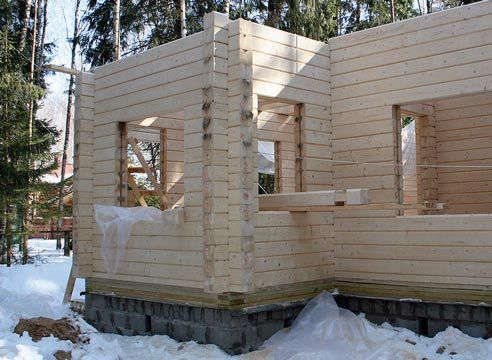 Дом из клееного бруса: строительство, защита и теплоизоляция