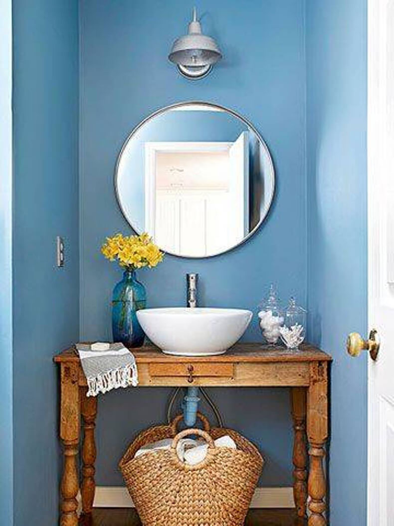 Круглое зеркало в ванной в интерьере